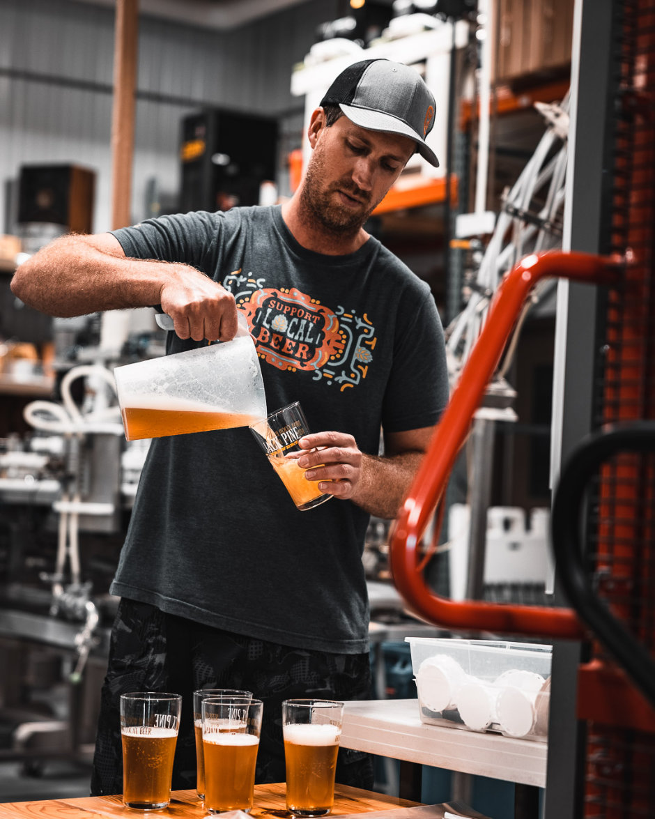 Jack Pine Brewer Pouring Samples Jack Pine Brewer Pouring Samples
